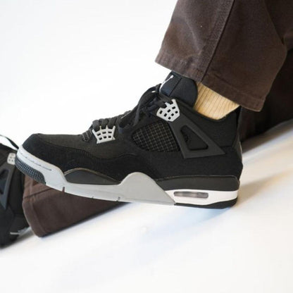 Air Jordan 4 Black Canvas.